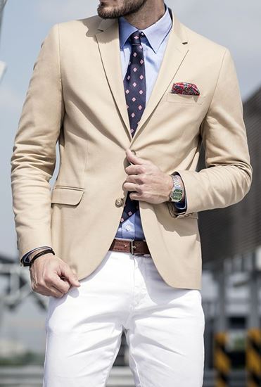 Picture of Beige jacket with white trousers